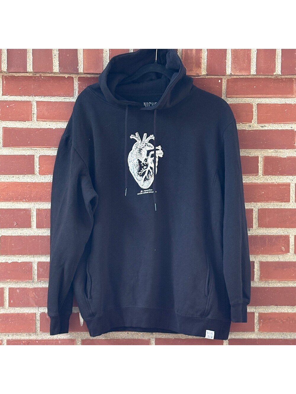 Niche Snowboards Black Hoodie with Anatomical Heart Print